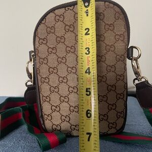 Black and Brown Classic Zippered ClosureCrossbody Bag with wide strap cherry red